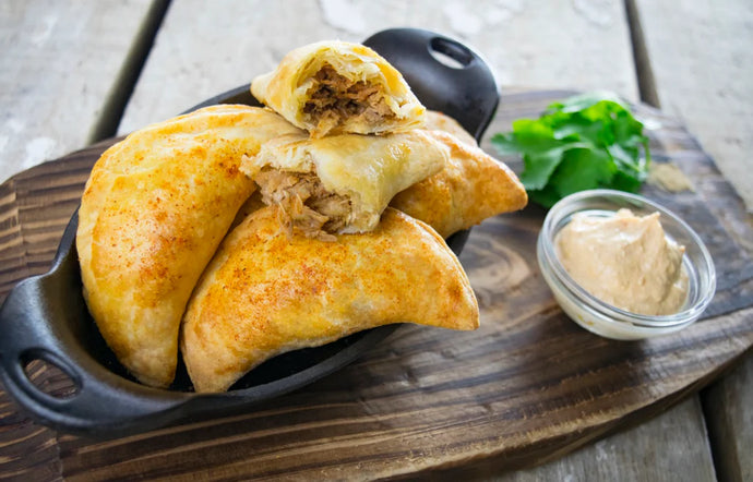 Spicy Garlic Braised Pork Empanadas with Piri Piri Yogurt